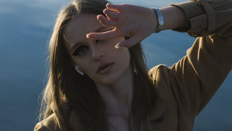 Woman Posing With Hand Over Face