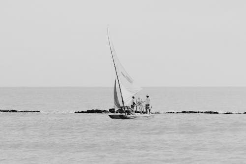 Floating Raft with Sail in the Sea