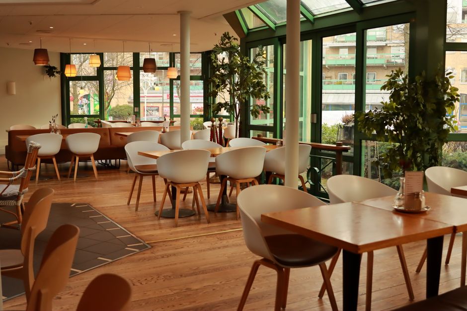 Lively common area of a modern hostel in Stockholm, Sweden
