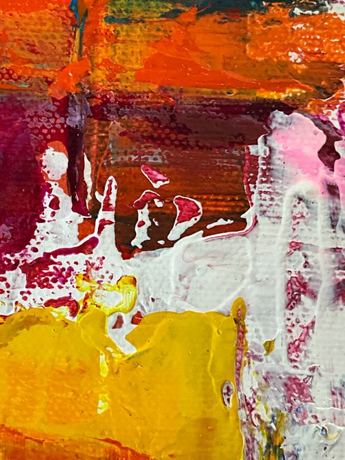 Free Colorful abstract painting with bold brush strokes and a mix of vibrant hues on canvas. Stock Photo