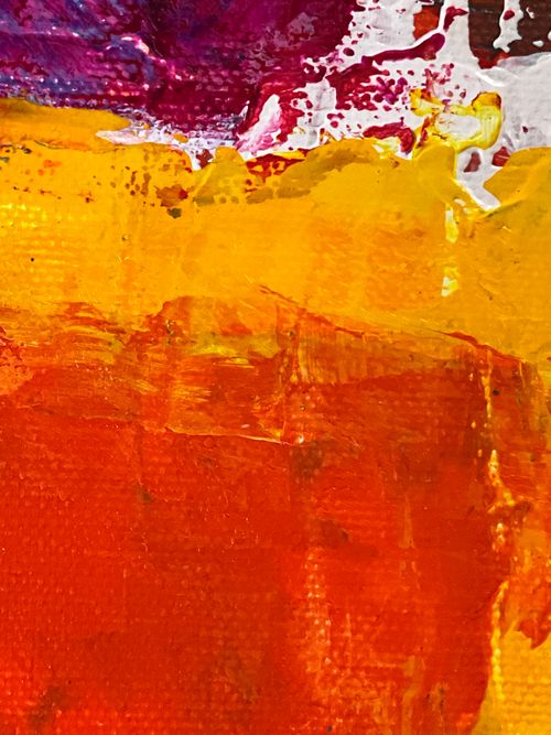 Free Close-up of a bold, colorful abstract oil painting with vibrant hues. Stock Photo