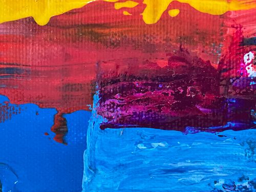 Free A vibrant multicolored abstract oil painting with bold strokes in yellow, red, blue, and purple. Stock Photo