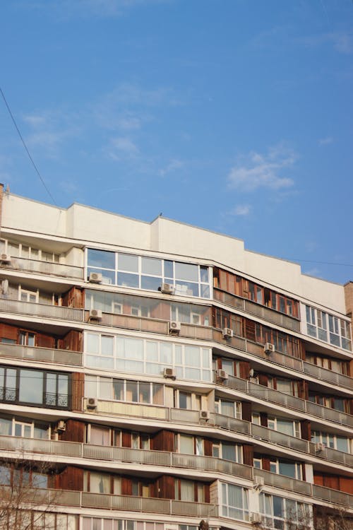A Block of Flats with Balconies and Air Conditioner