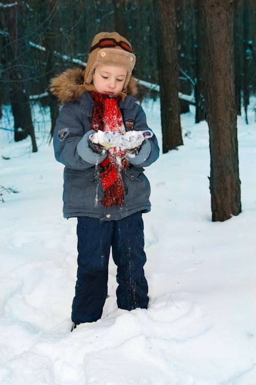 Person Playing With Snow