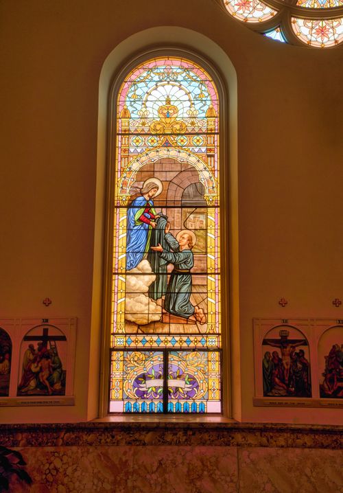 Free Vibrant stained glass window depicting religious imagery in a Winona church. Stock Photo