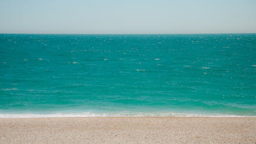 Azure Sea and an Empty Beach 