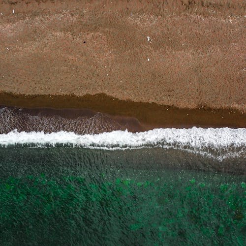 Бесплатное стоковое фото с Аэрофотосъемка, берег океана, вид сверху