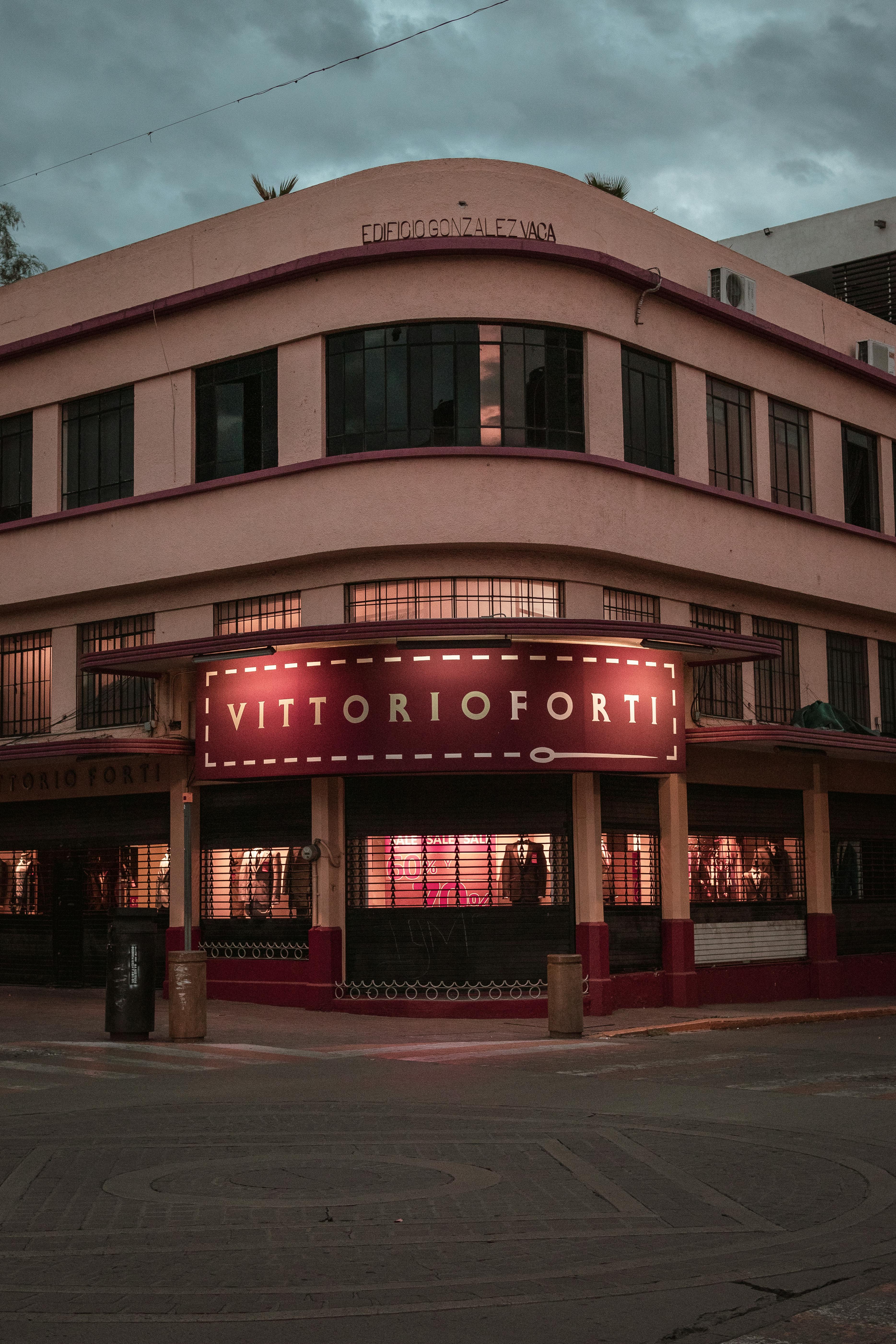 Free Illuminated theatre facade in Aguascalientes, Mexico, capturing a vintage night scene. Stock Photo