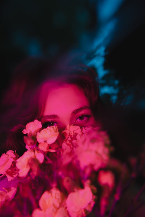 A woman with flowers in her face