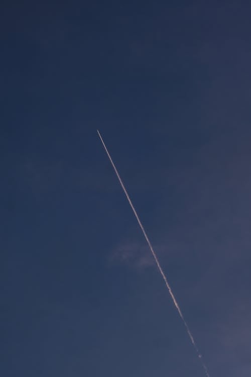 A Plane on a Blue Sky