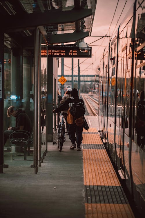 People on a Subway Platform at Dusk