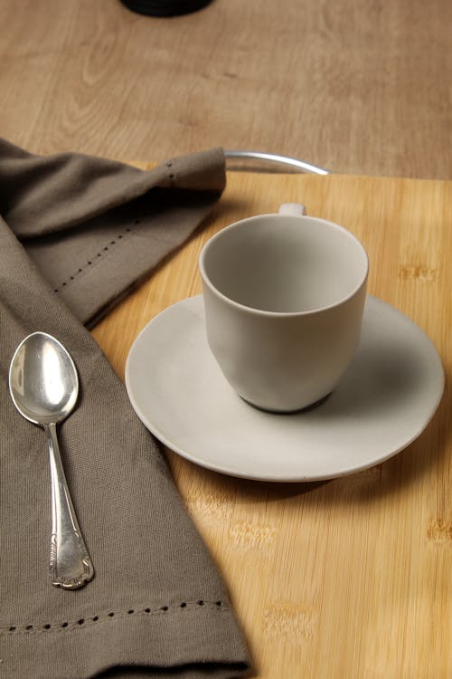 Empty Cup on a Wooden Table