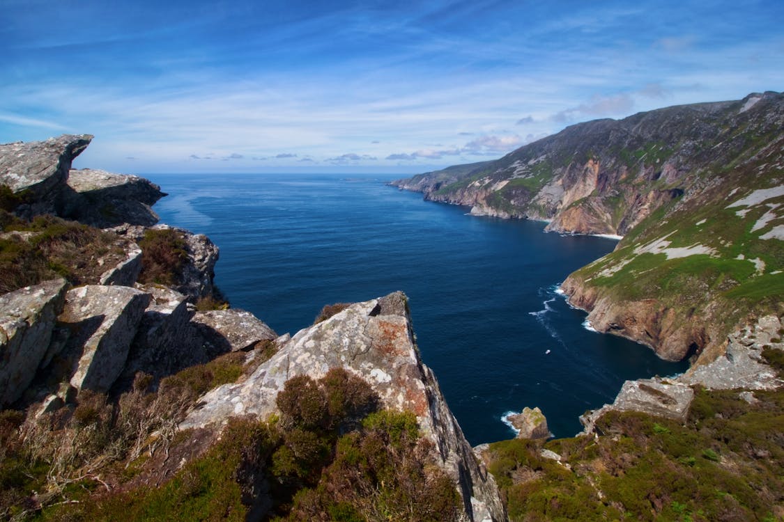 Free Landscape Photography Of Mountain Near Body Of Water Stock Photo