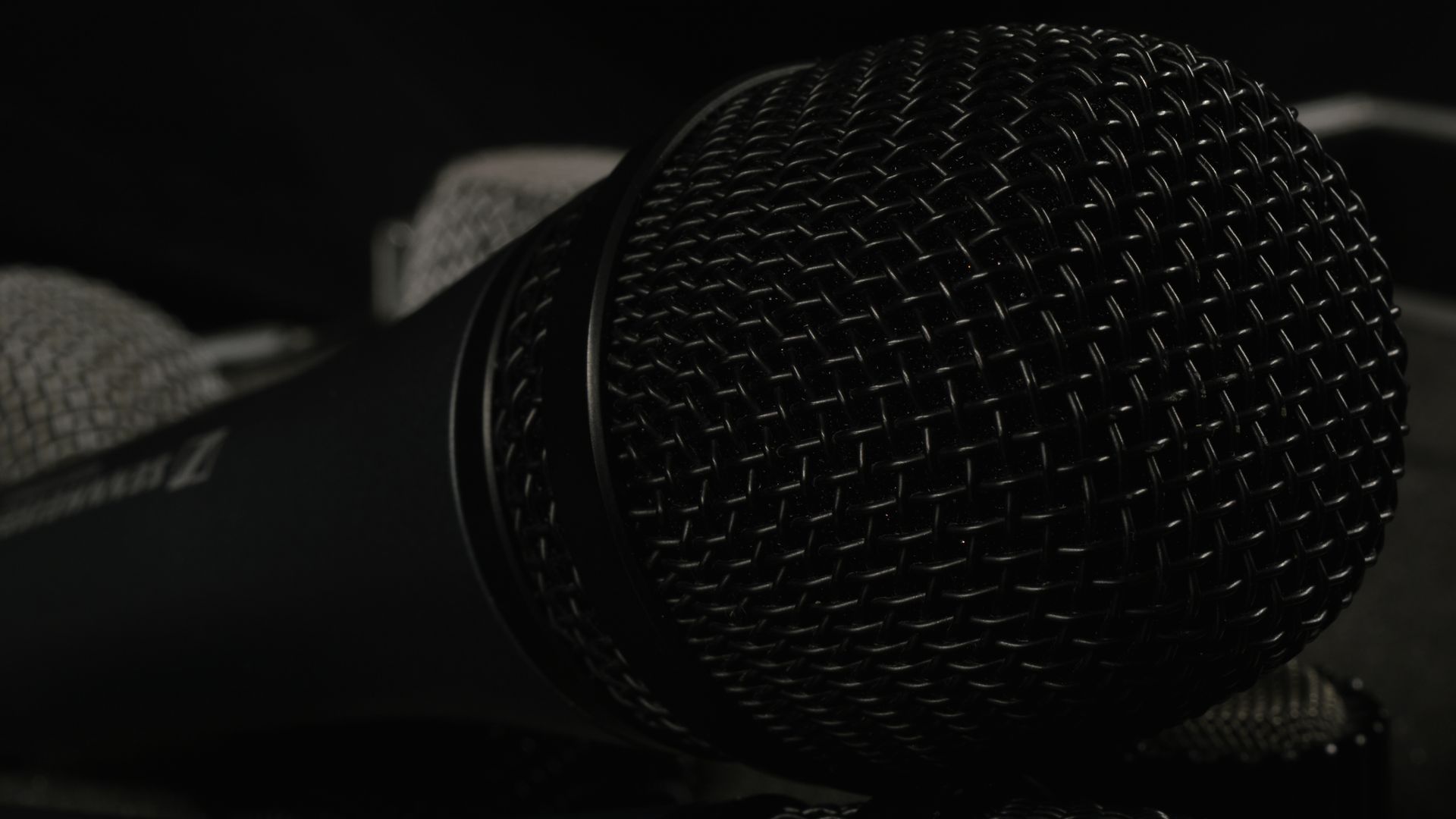 Microphones Near Me: Your Ultimate Audio Companion 5 A detailed close-up of professional microphones featuring windscreens, ideal for tech and audio themes — microphones near me