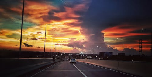 Fotos de stock gratuitas de atardecer, autopista, calle