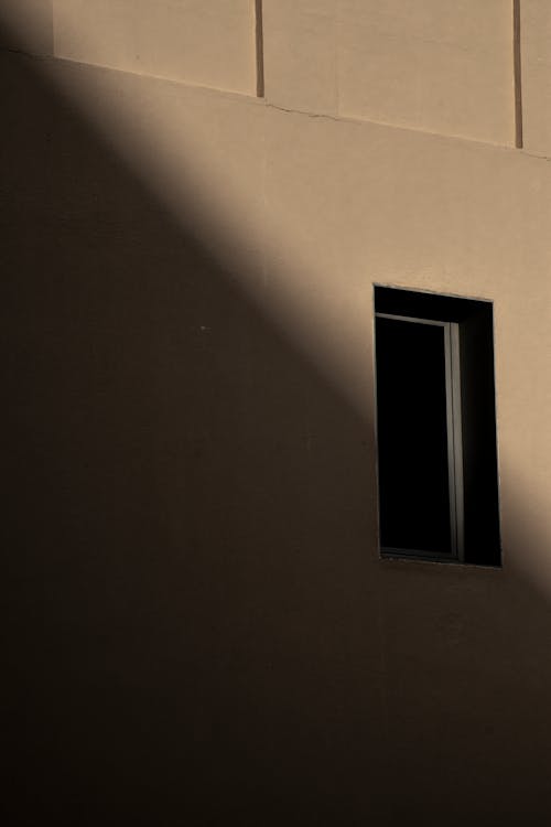 Shadow Covering a Wall with a Rectangular Window