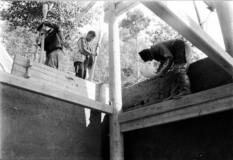 Builders On Construction Site