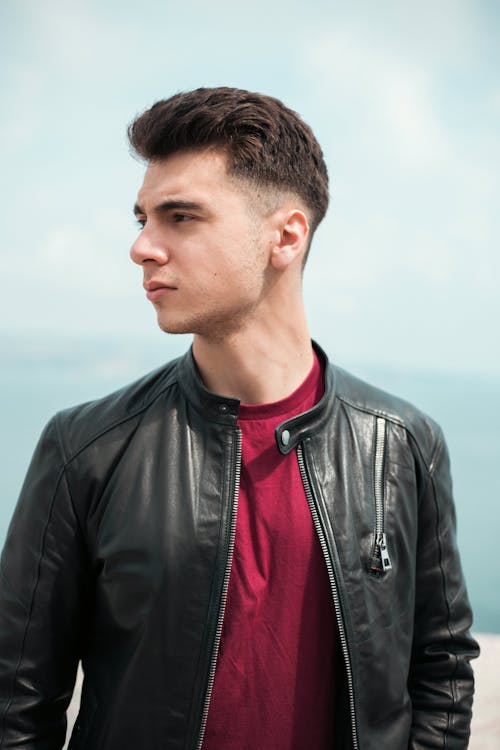 Young Man in a Casual Outfit Looking Away 