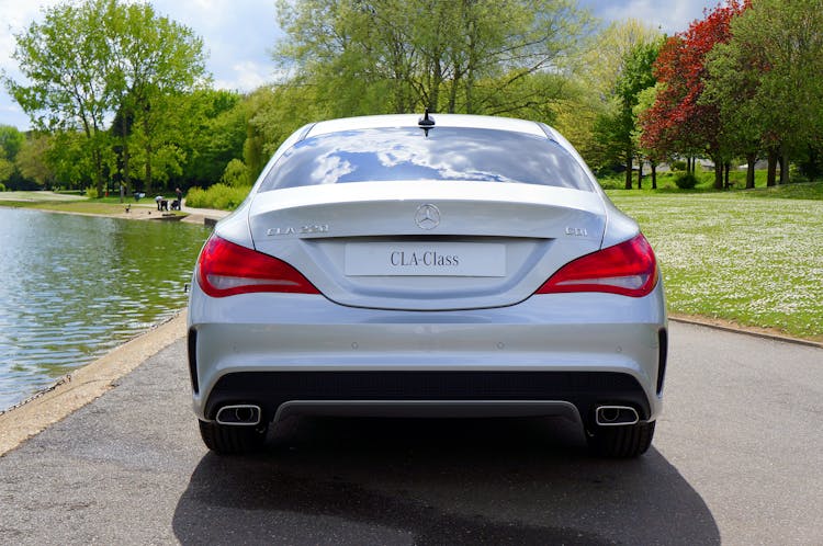 Back View Of A White Mercedes Car 