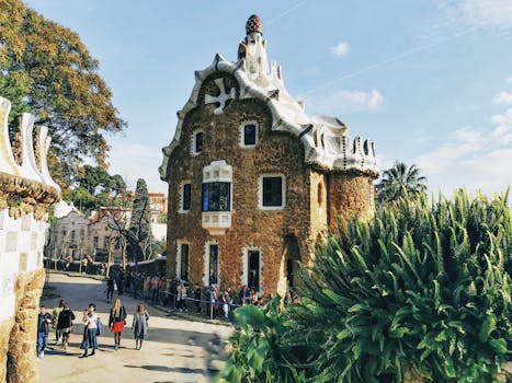 Explore the unique architecture of Gaudí at Casa del Guarda in Park Güell, Barcelona.