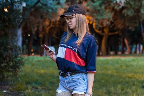 Free Woman Holding Smartphone Stock Photo