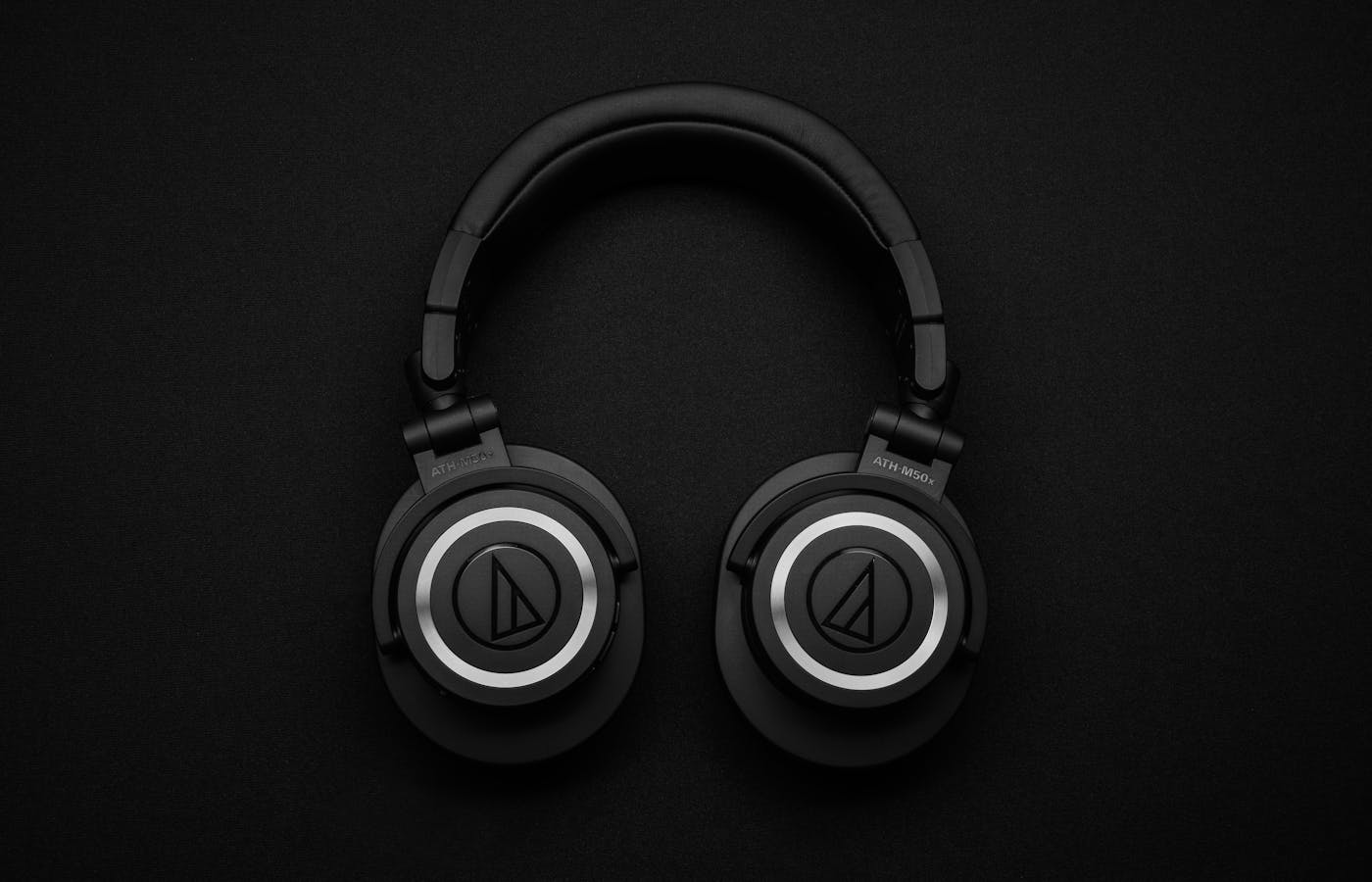Close-up of premium audio headphones with detailed ear cushion