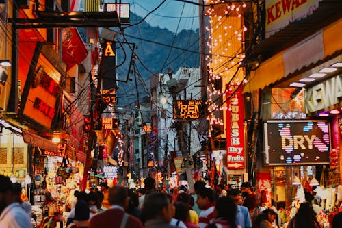 Crowded Street in a City at Dusk 