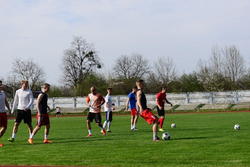 Men Playing Soccer 