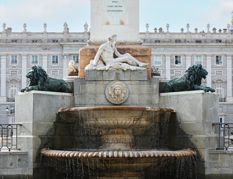 A Sculpture In Front Of A Palace