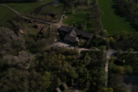 Aerial view of the Biskupin archaeological site in Poland, showcasing ancient village structures.