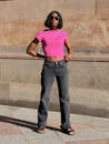 Pretty Girl Wearing Sunglasses, Pink Top and Jeans