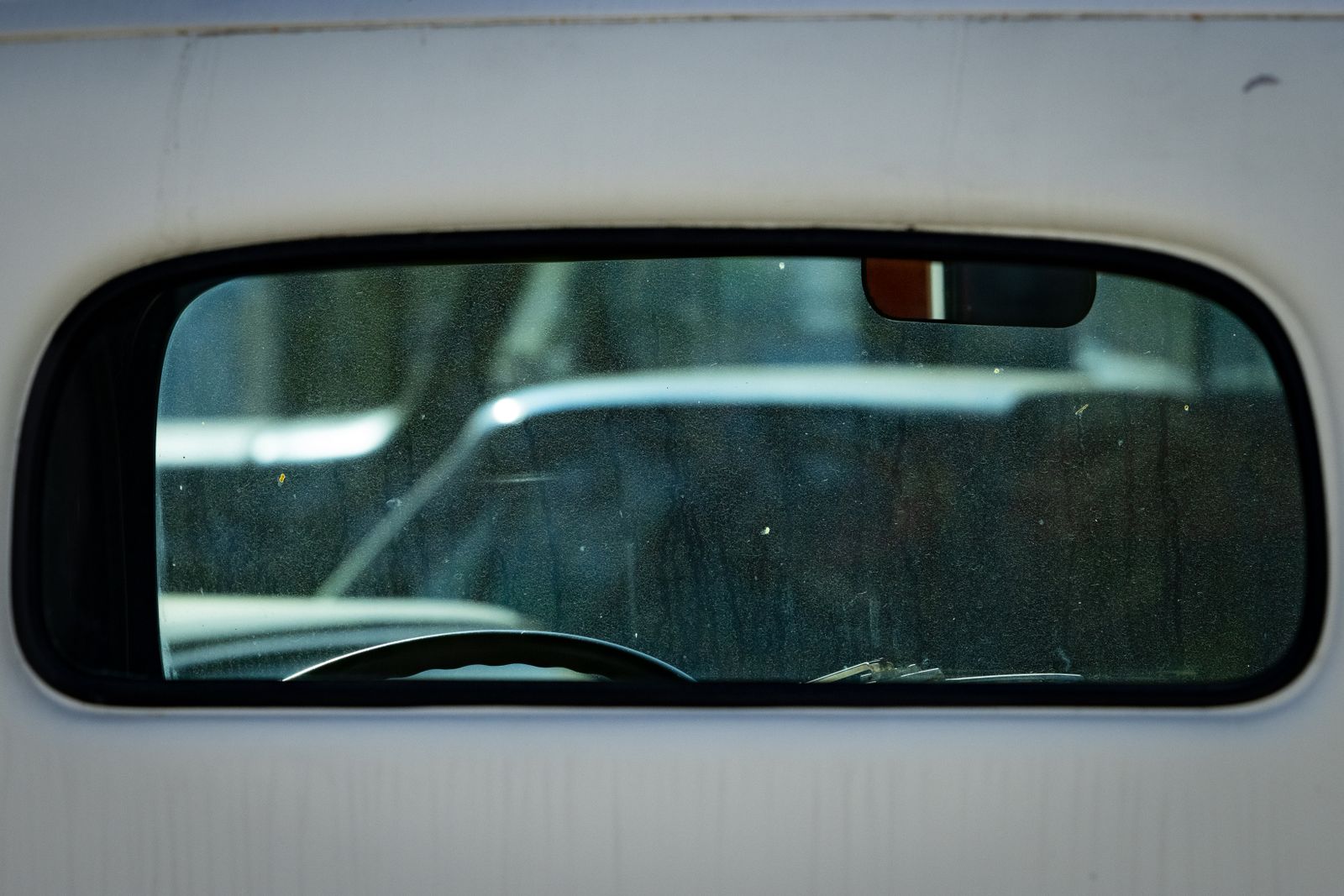 Portrait In Rear View Mirror Person Taking a Self Portrait on a Rear View Mirror · Free Stock Photo