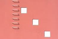 Pink Building Facade with with Emergency Fire Escape