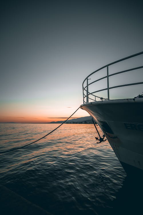 Side of a Ship in the Sea at Sunrise 