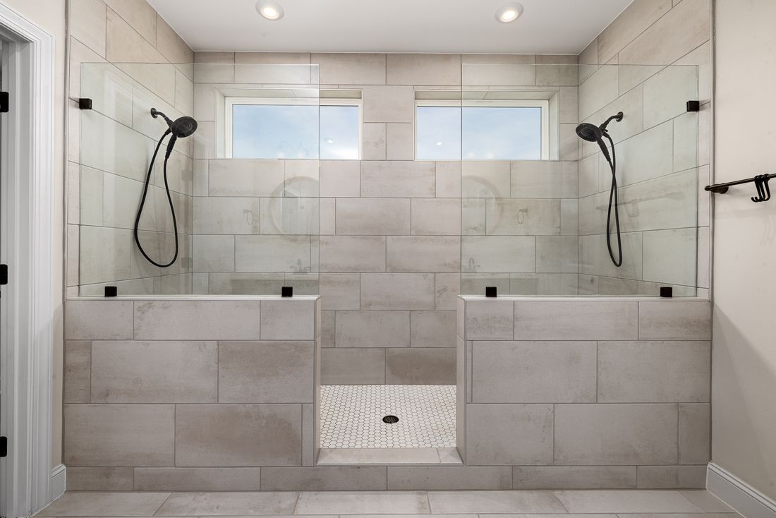 Detailed tile shower and bathroom finish work.