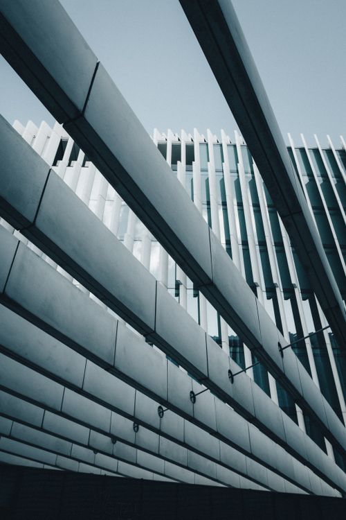 Free Low angle shot of a modern office building in Lisbon, showcasing contemporary design. Stock Photo