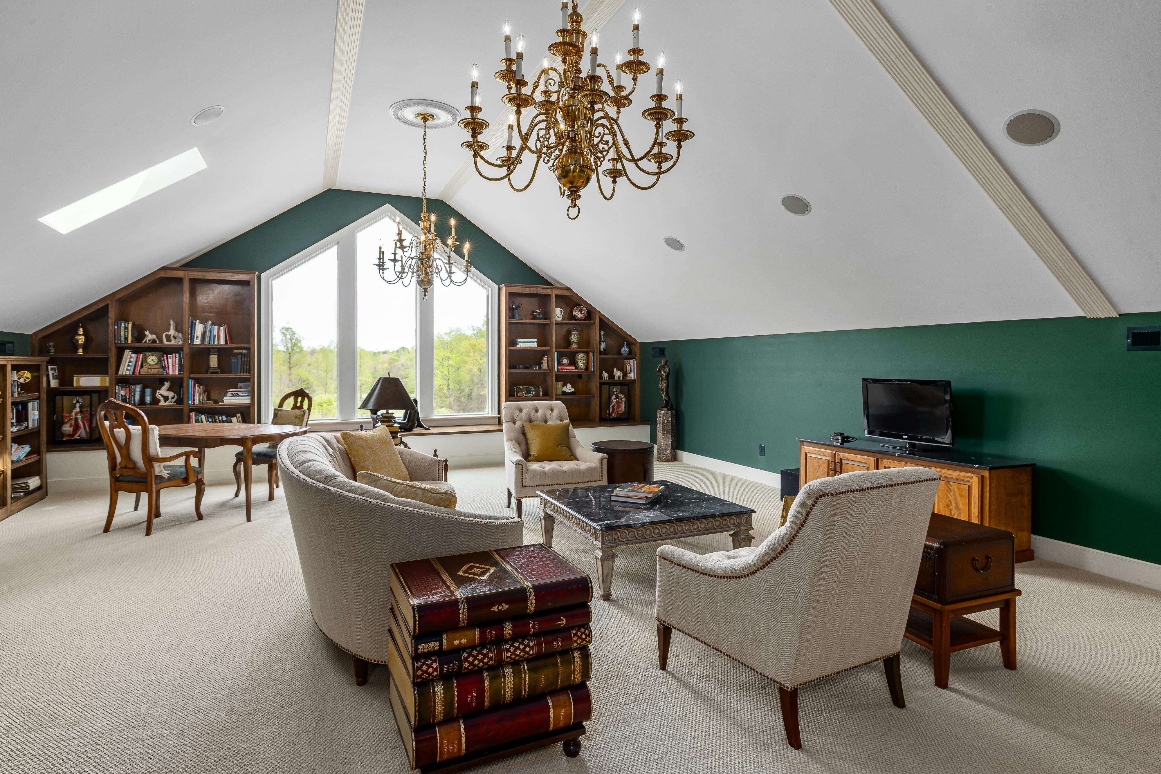 Luxury library with custom millwork and integrated lighting design