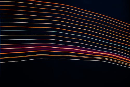 Abstract Image with Bright Colour Lines against Black Background