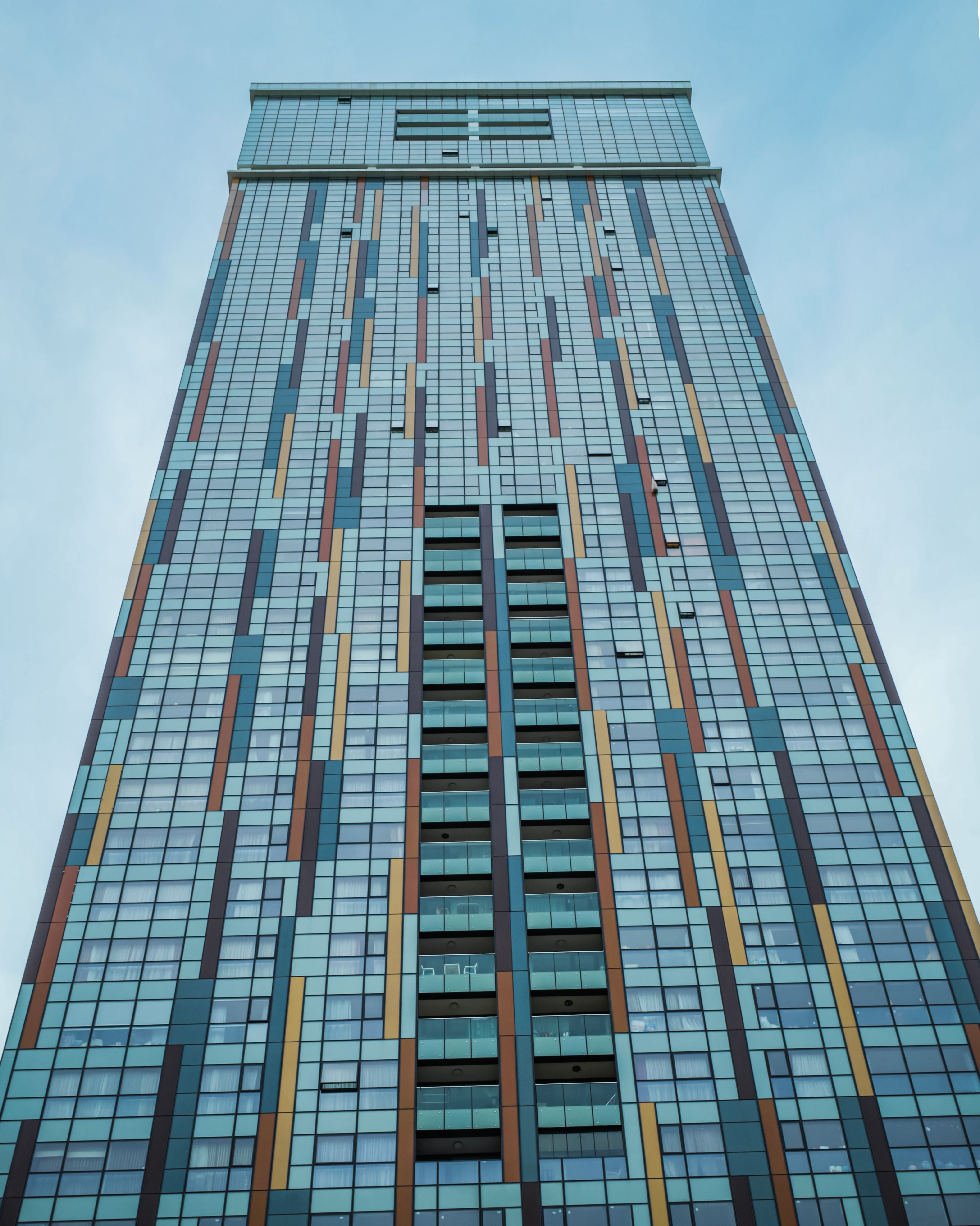 Low Angle Shot of a Modern Skyscraper in City · Free Stock Photo