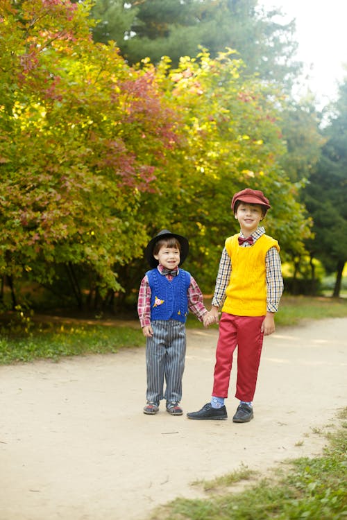 Free Two Boys Standing on Pathway Stock Photo
