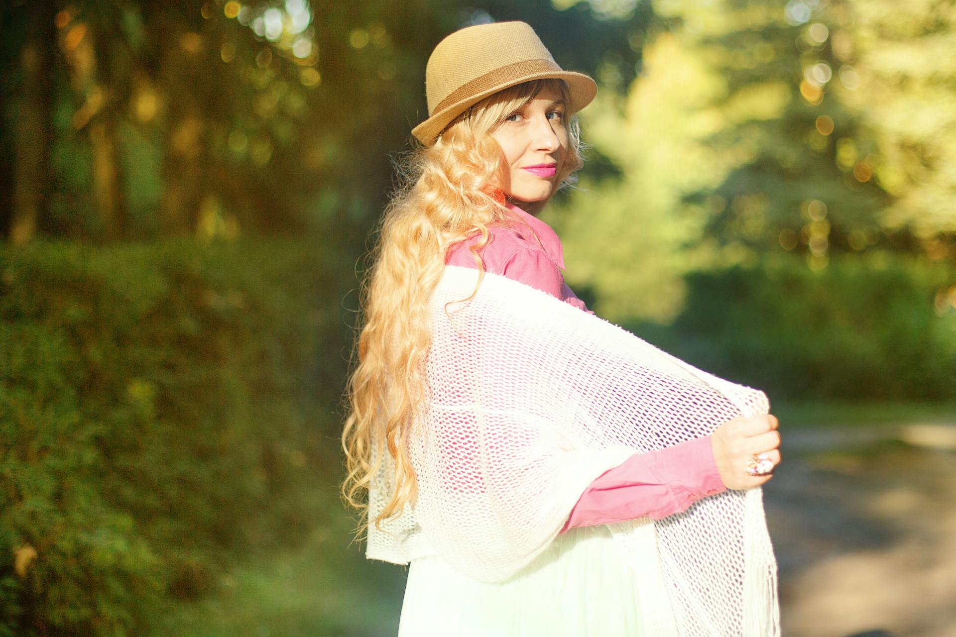 Woman Standing While Wearing Cardigan