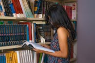 Woman with Books at Library