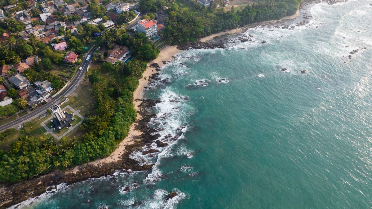 Pristine Sri Lankan coastline where nomads are basing themselves in 2026