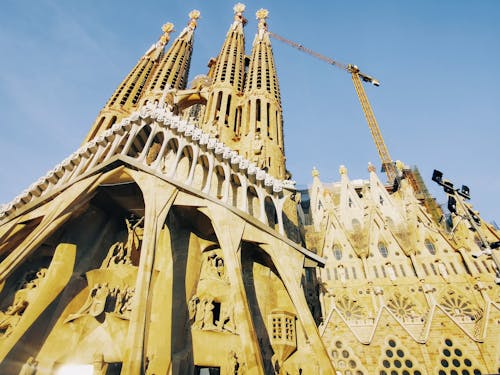 Low Angle View of a Cathedral and a Crane 