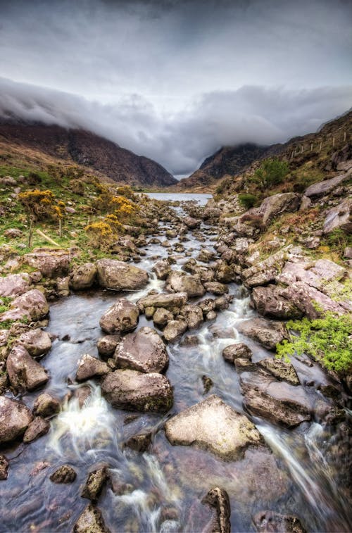 Photo of River Under Cloudy Sky