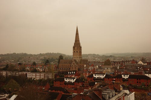 View of the City with the St Michael and All Angels Church Tower in the Middle in Devon, England