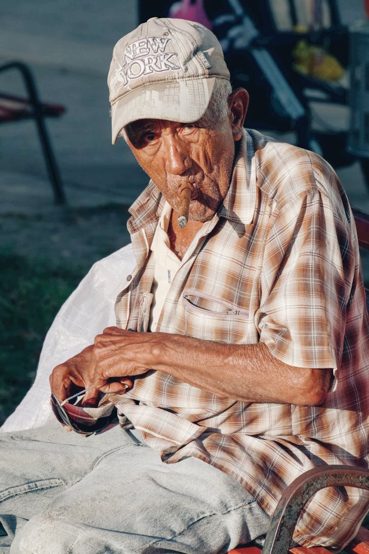 Elderly Man Smoking Cigar