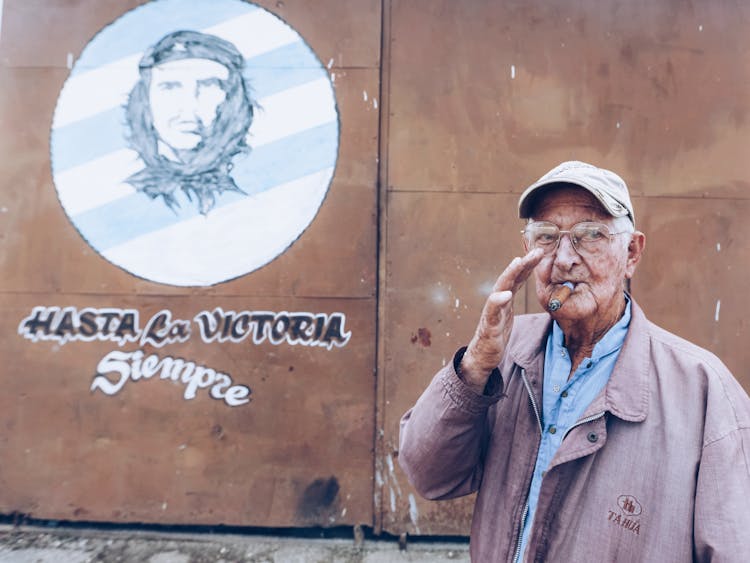 Eldery Cuban Man Smoking A Cigar 