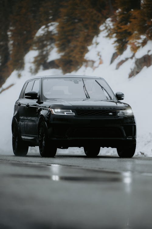 SUV Car on the Road in Winter 