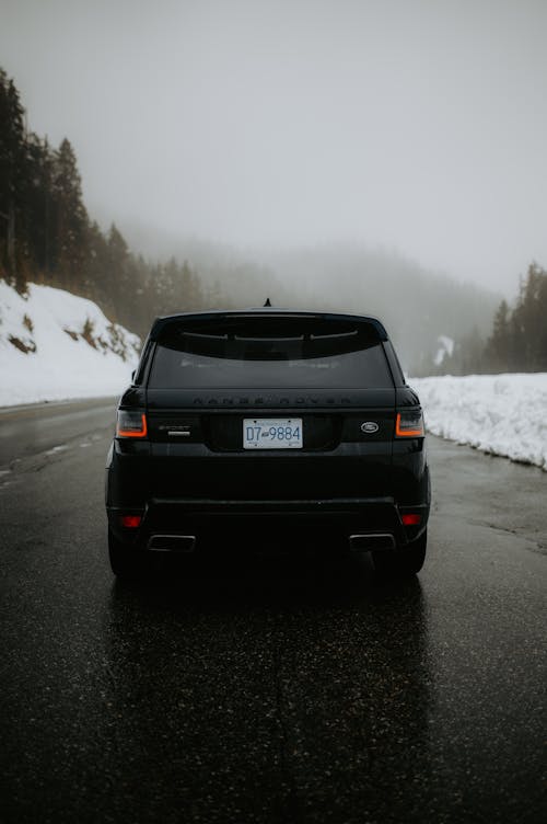 SUV Car on the Road in Winter 